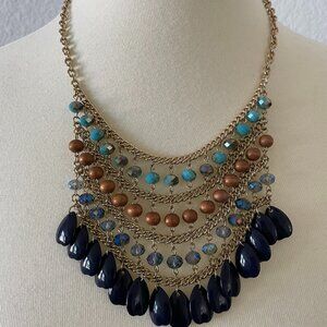 Beaded multistrand brazz-like necklace